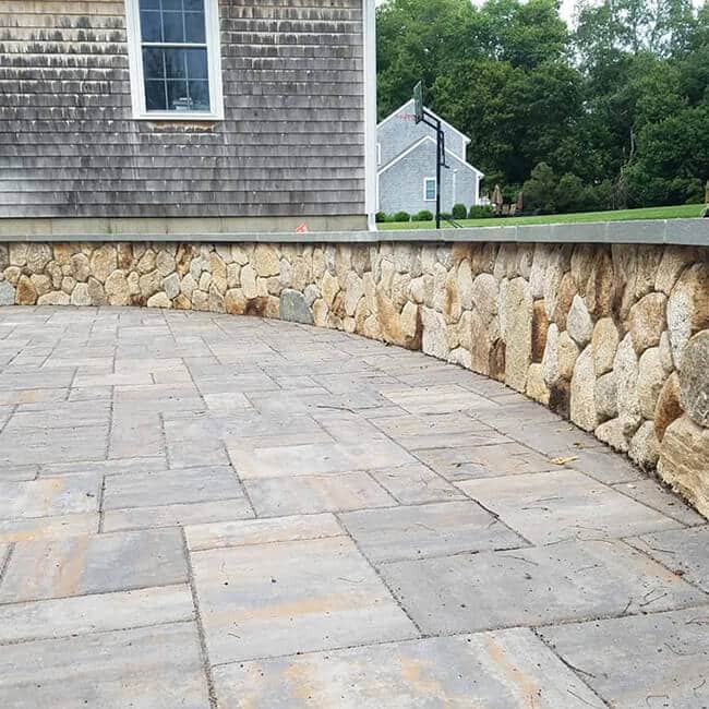 Stone wall in a home in Marion MA by Brian DeMedeiros BD Masonry.